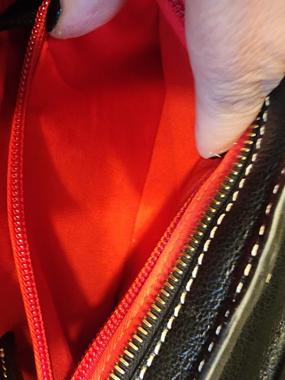 vintage Dooney & Bourke black leather shoulder bag featuring gold-tone hardware